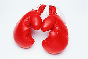 pair of red-and-white boxing gloves HD wallpaper